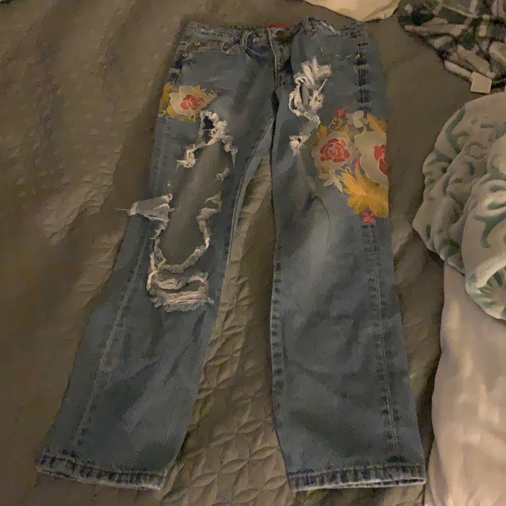 Caffeine embroidered ripped jeans